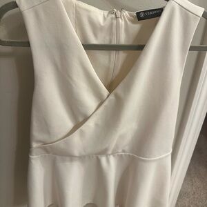 Versona Ivory Sleeveless Peplum Top | V-Neck Zip Back Blouse